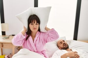 woman affected by partner's snoring