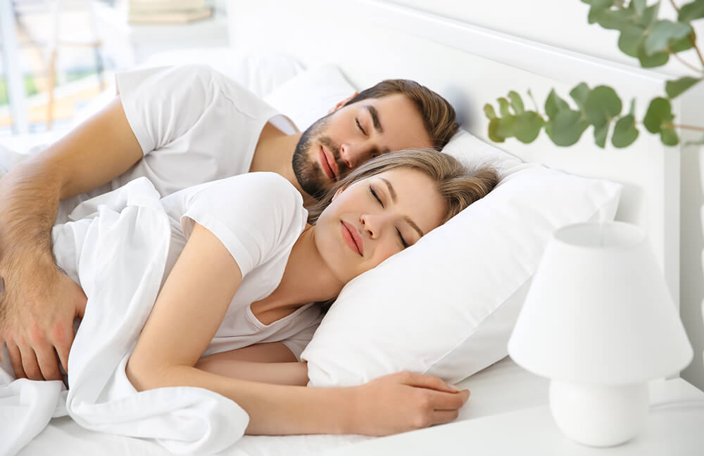 young sleeping couple